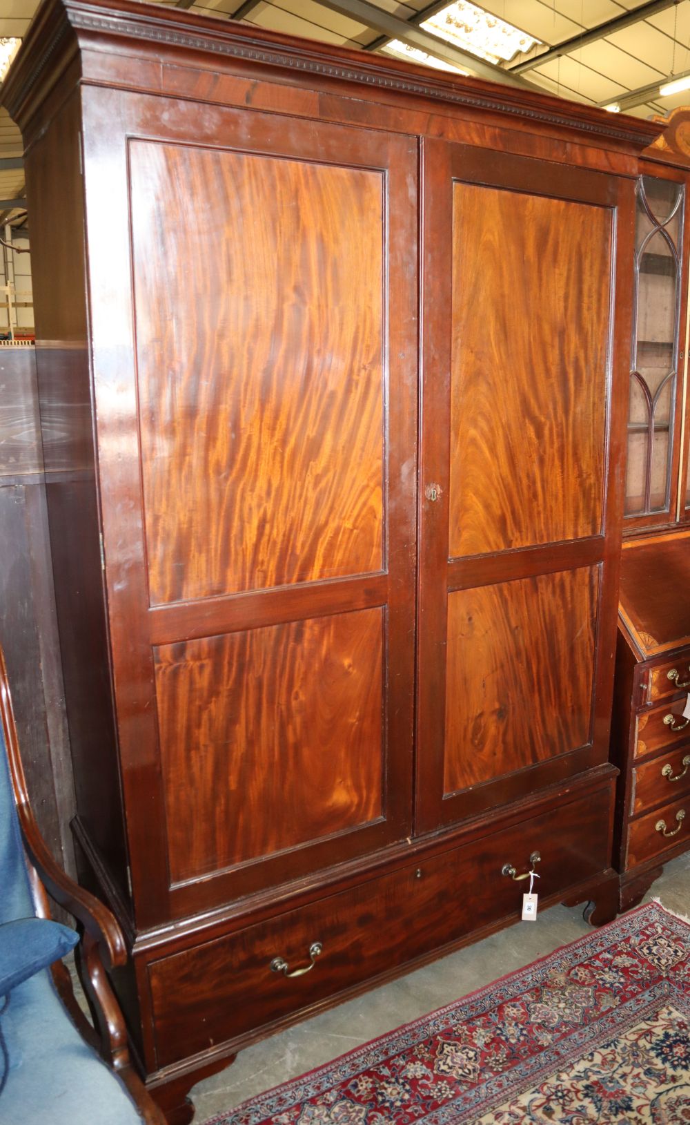 A 1920s George III-style mahogany wardrobe, W.134cm, D.52cm, H.206cm